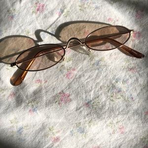 Golden Tinted Warm Oval Sun Glasses